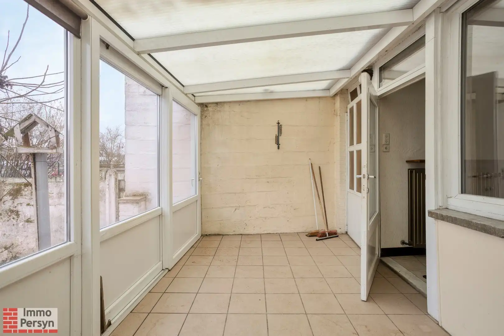 Te renoveren woning met 3 (mogelijks 4) slaapkamers en tuin met uitweg foto 7