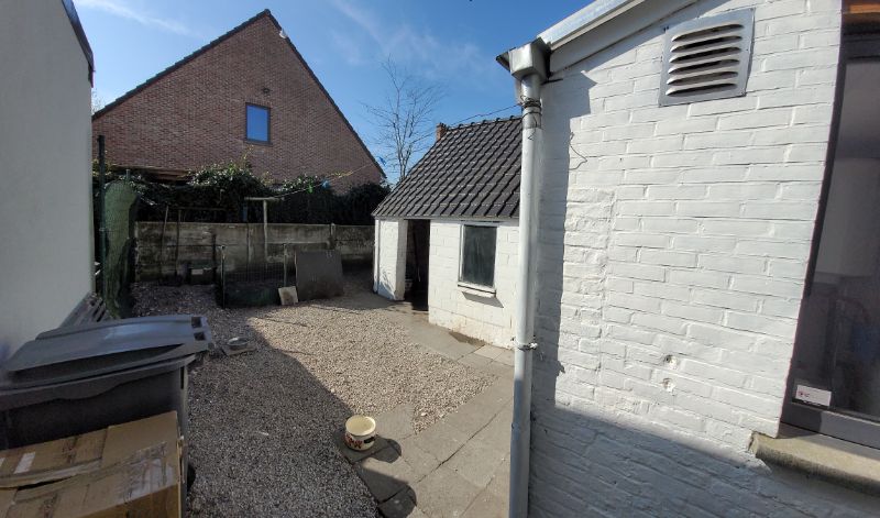Knusse rijwoning in half-open bebouwing foto 5