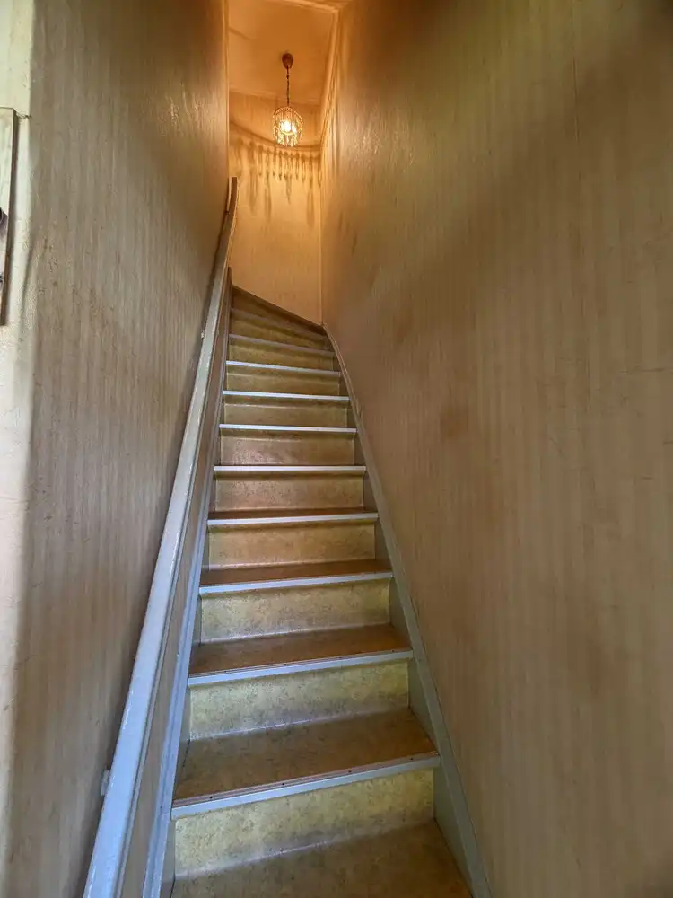 Rustig gelegen wijkwoning met zongerichte tuin foto 13
