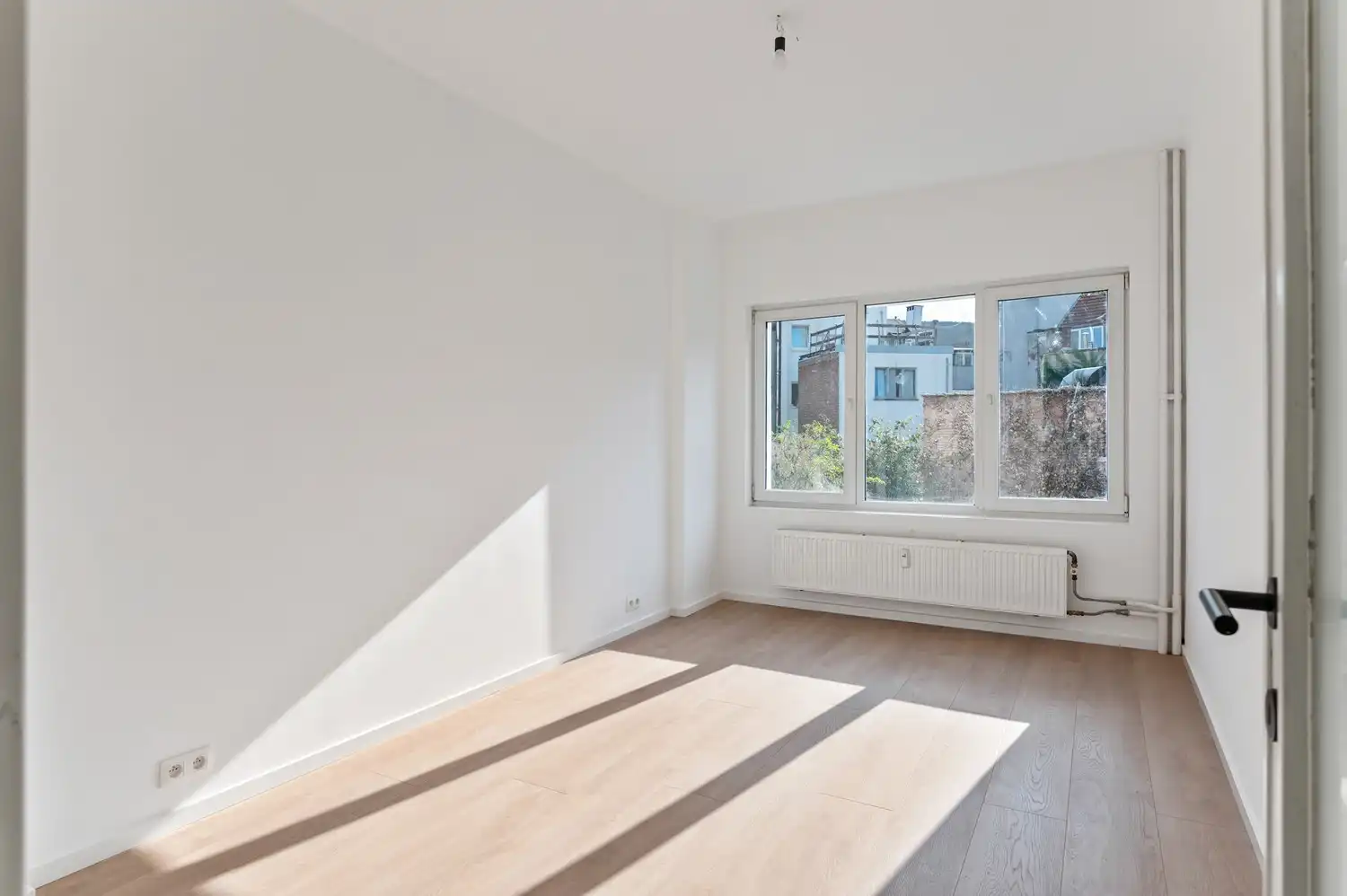 Licht en ruimte in het hart van Antwerpen – 1 slaapkamer appartement foto 8