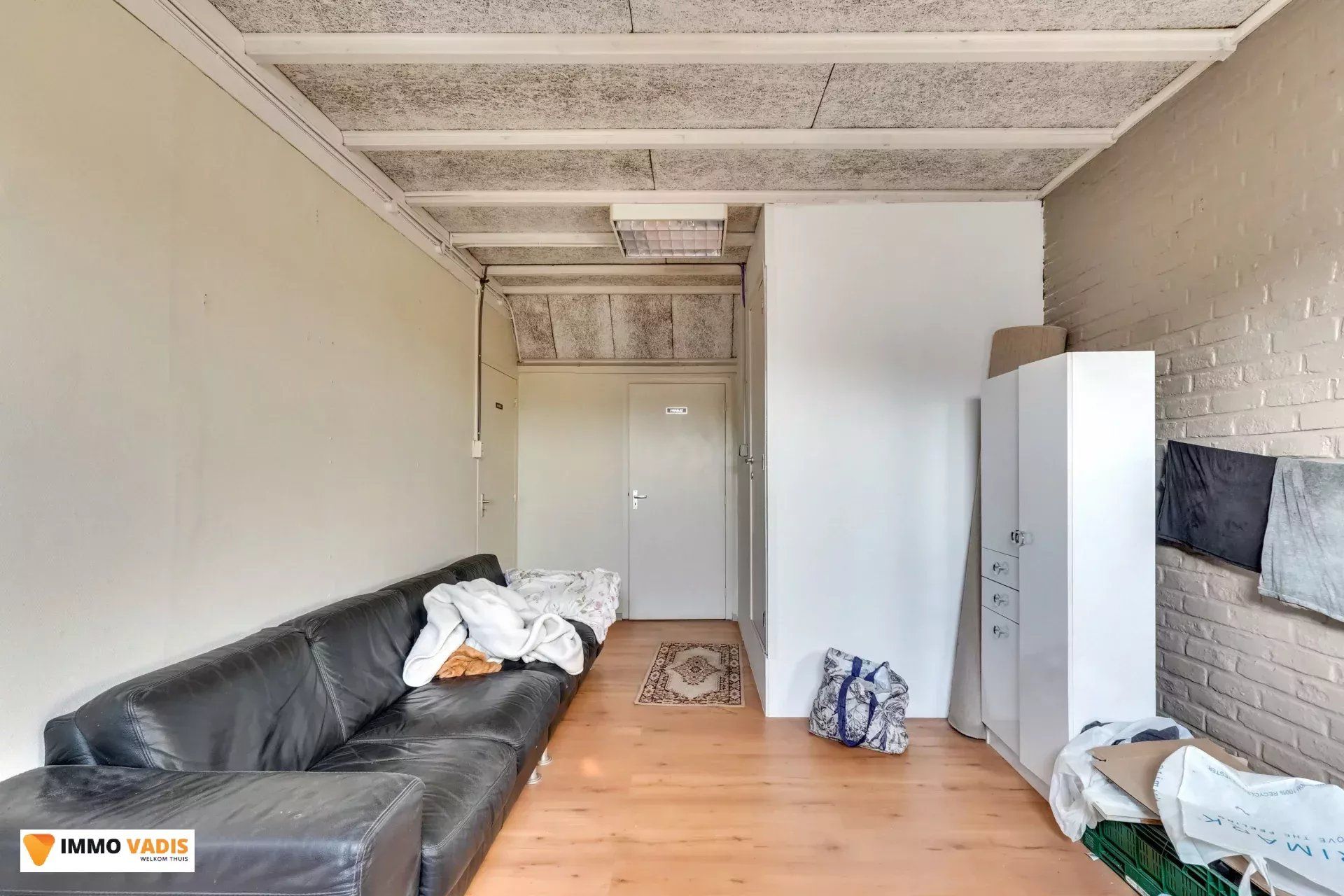 Handelspand met woonst en naastliggende woning foto 7