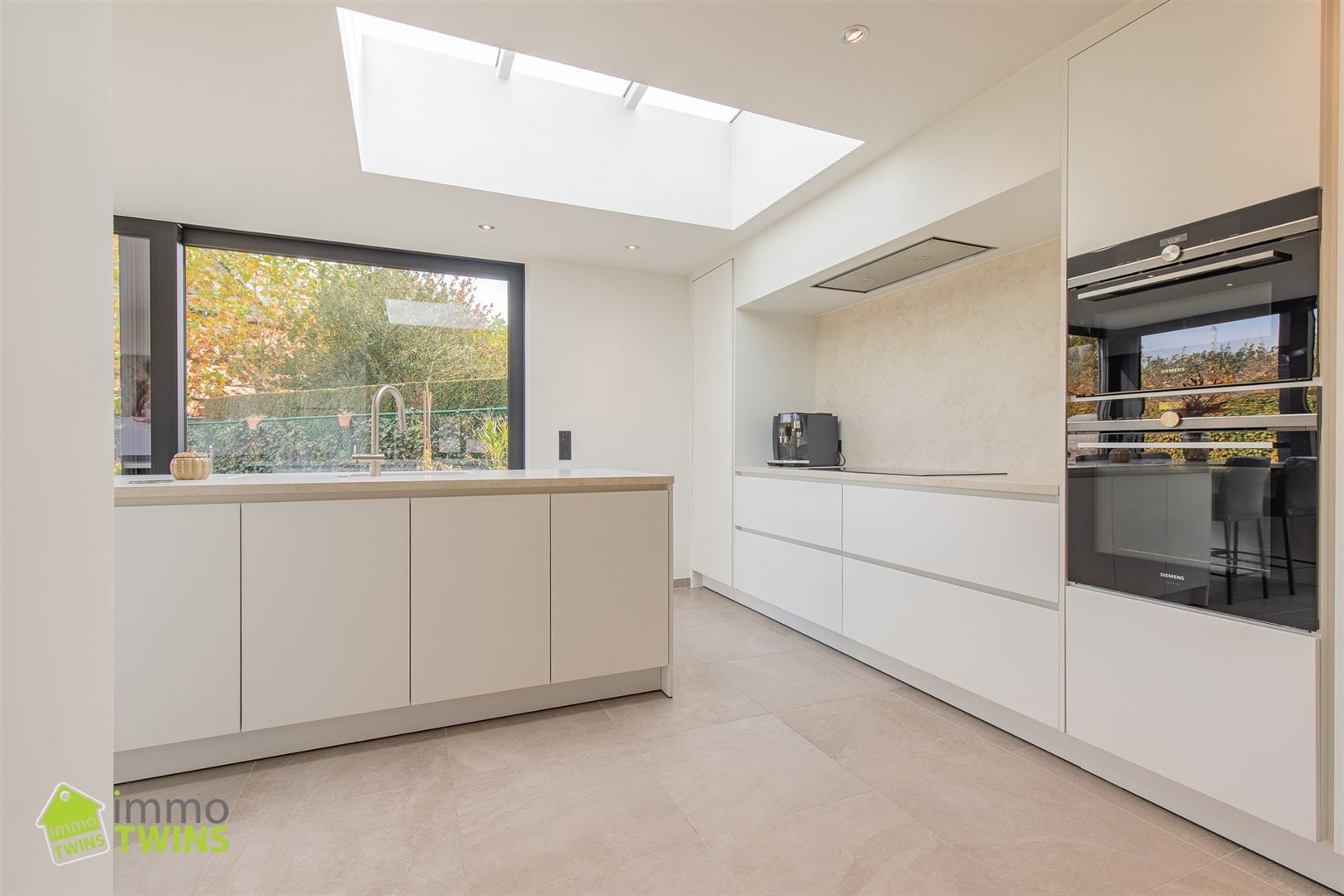 Gezellige open bebouwing met garage, tuin en oprit te Grembergen foto 3