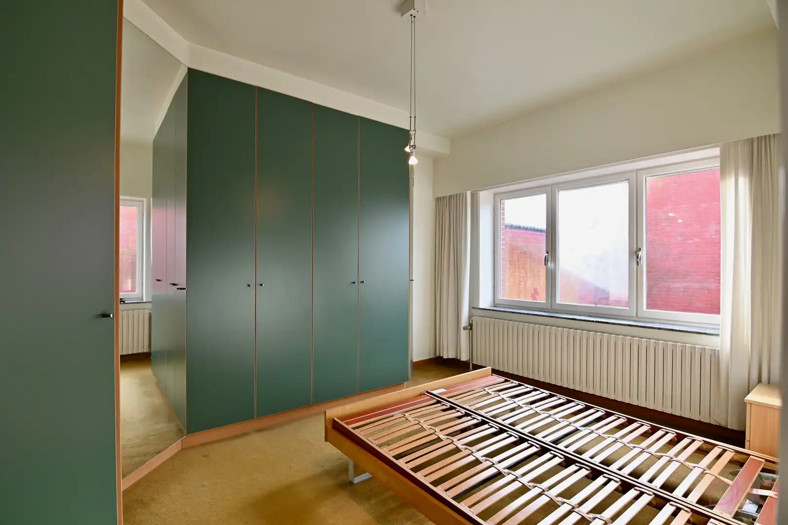 Ruime licht op te frissen woning nabij het centrum van Tienen met 3 slaapkamers op een perceel van 6a 40ca foto 12