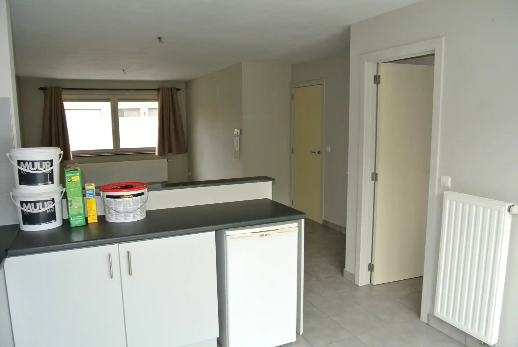 Gezellige gelijkvloers appartement  met 2 slaapkamers + terras en tuintje foto 8