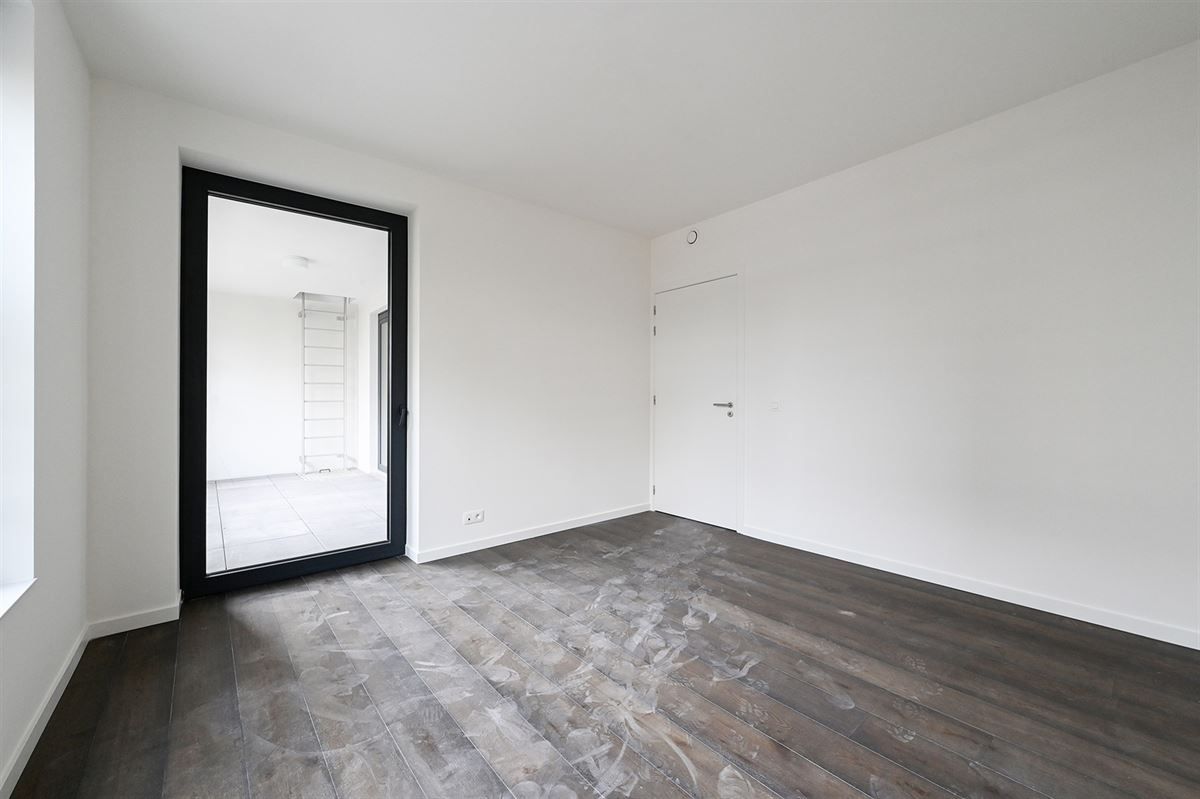 Ruim 1 slaapkamerappartement met groot terras in project Zilverkwartier te Berchem foto 14