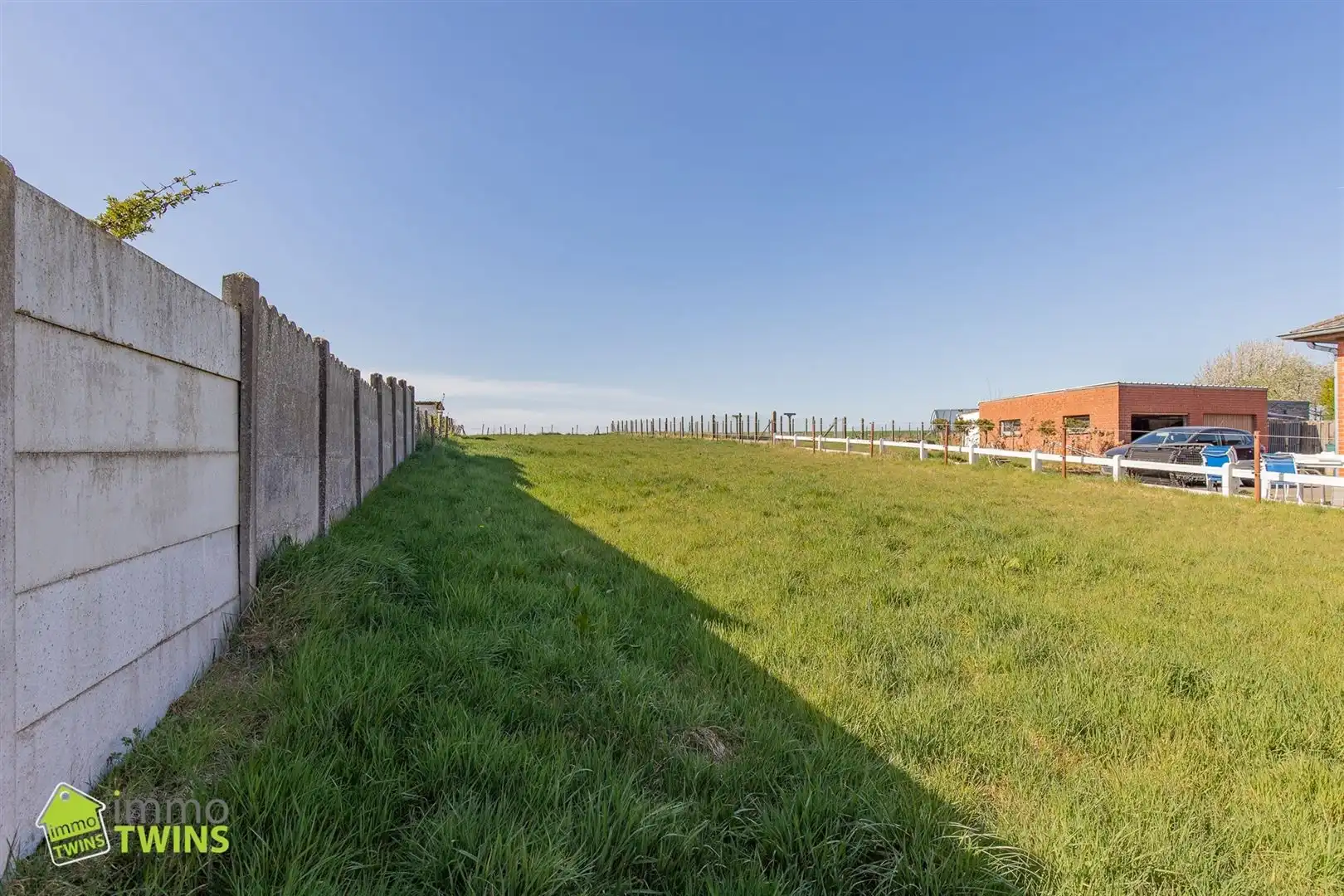 Bouwgrond halfopen bebouwing met weids groenzicht te Ninove foto 4