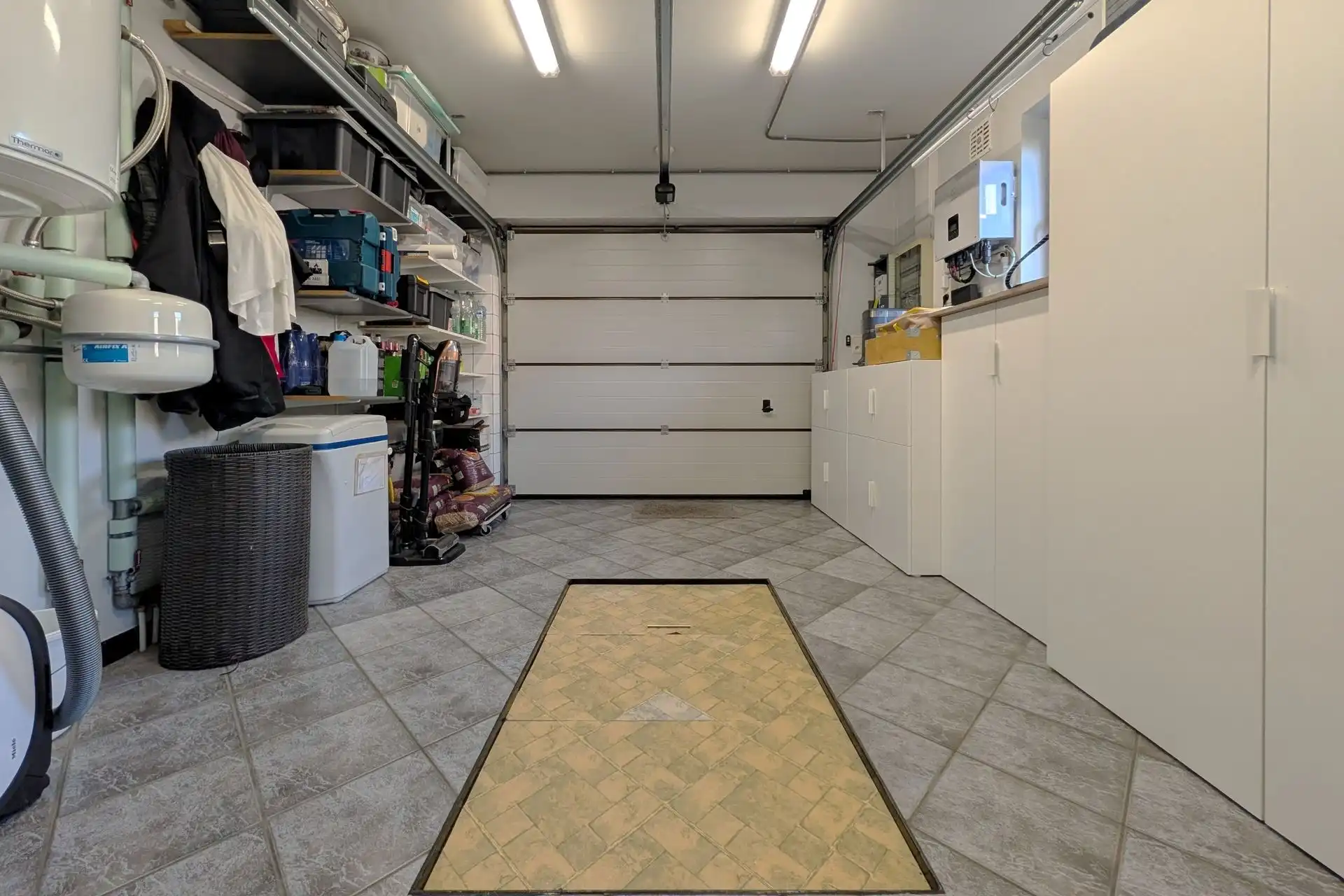 Instapklare gezinswoning met 3 slaapkamers en gezellige tuin foto 12