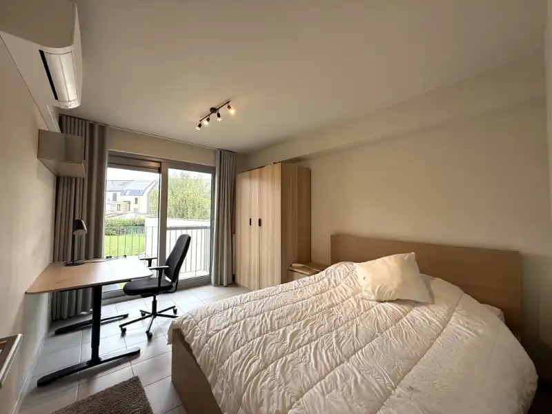 Gemeubeld appartement met ruim dakterras tussen UZ en Sint-Pietersstation foto 7