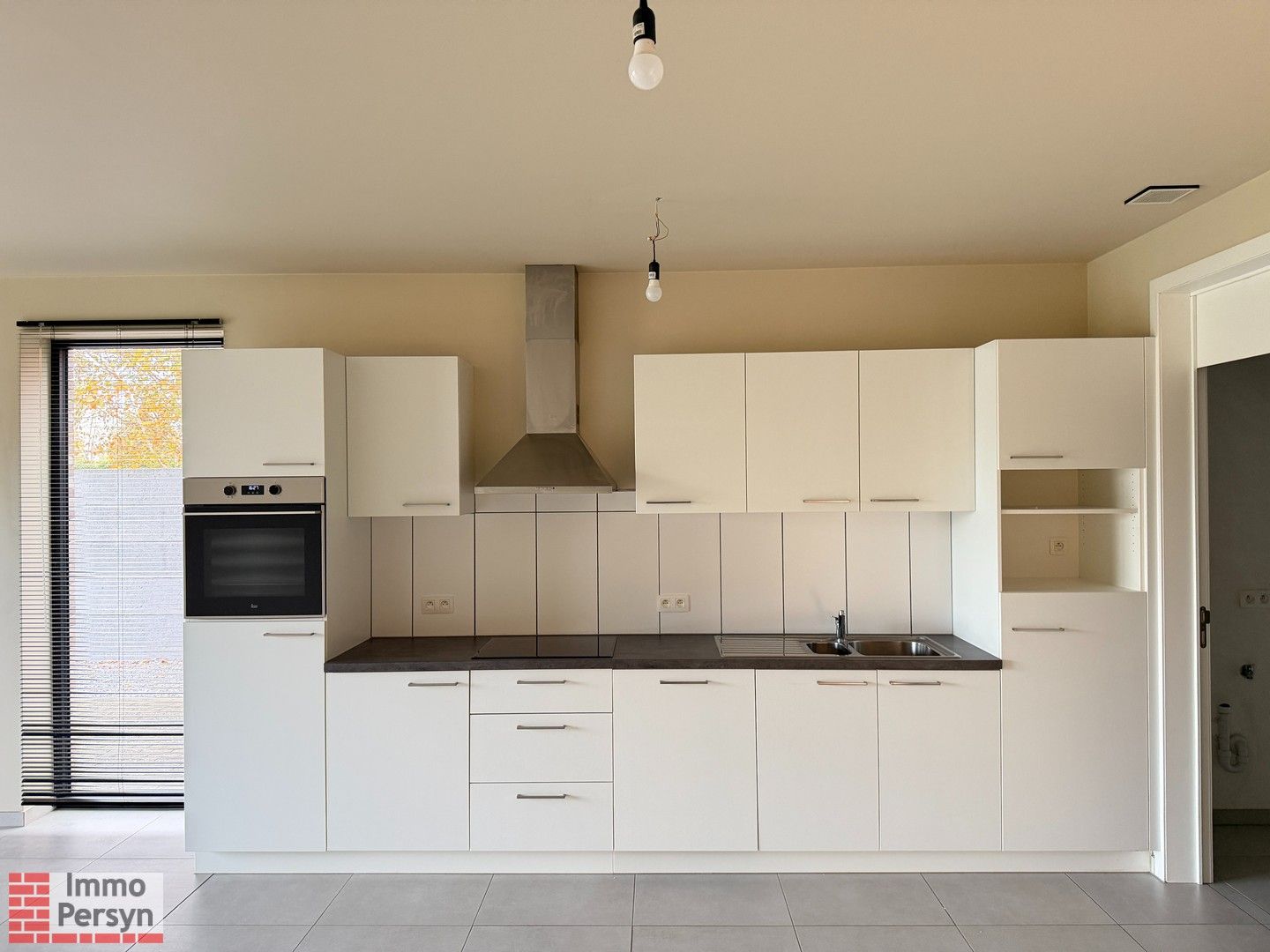 Gelijkvloers  3-slaapkamerappartement met terras foto 4