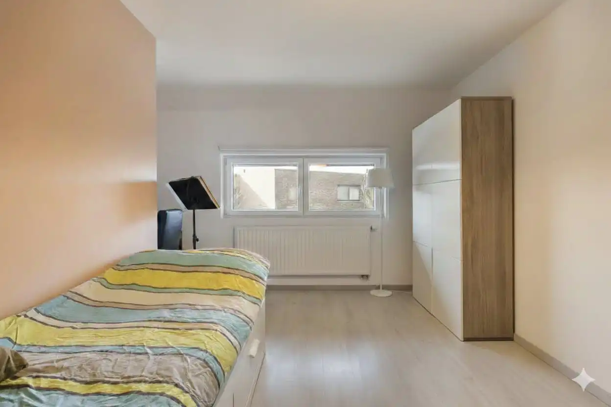 Moderne halfopen woning met 3 slaapkamers te Koop in Evergem foto 8