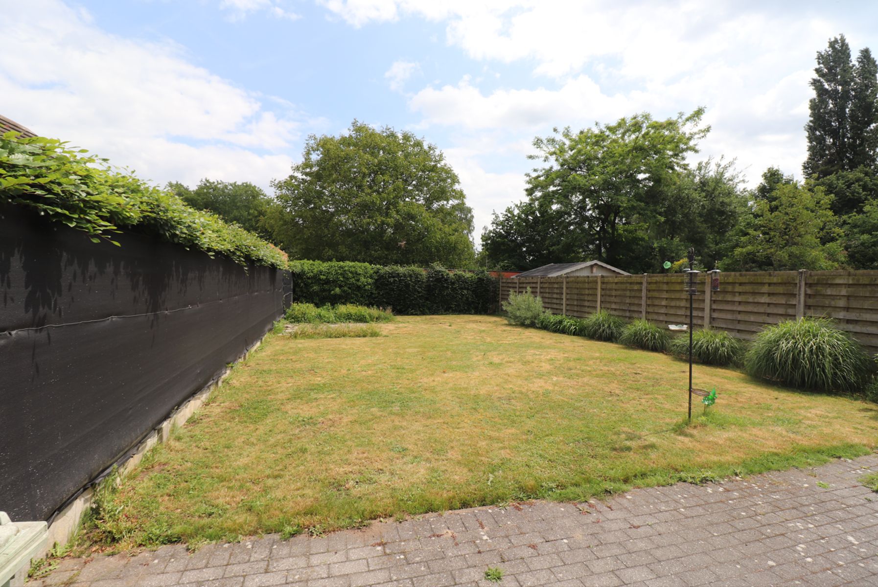 Halfopen bebouwing met 4 slaapkamers en tuin. foto 13