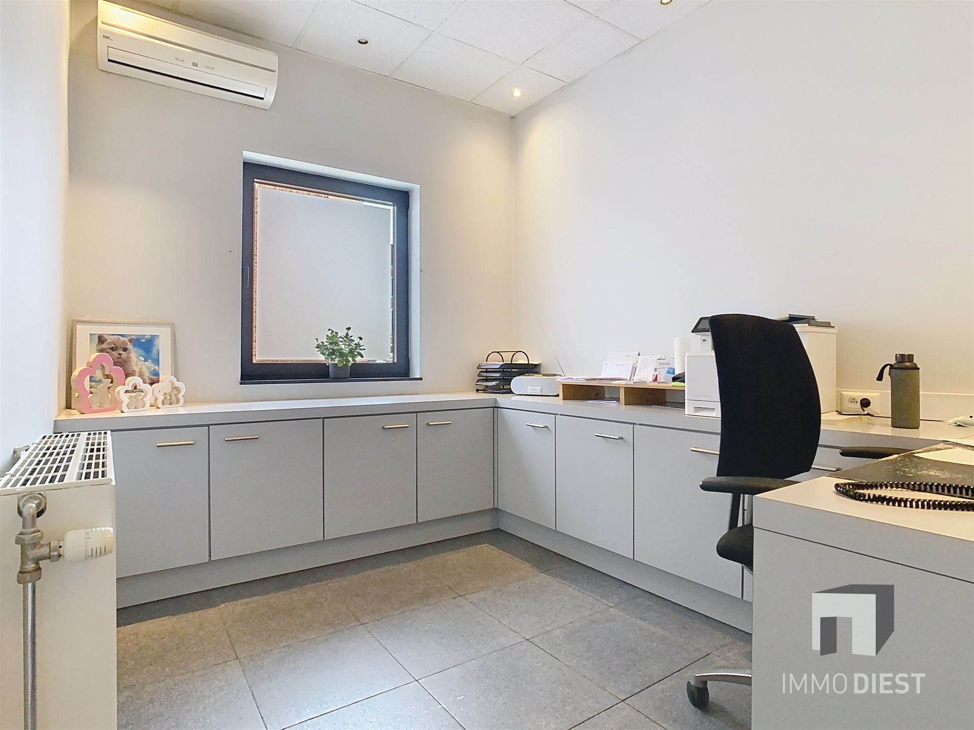 Opgedeeld handelspand in het centrum van Tessenderlo foto 6