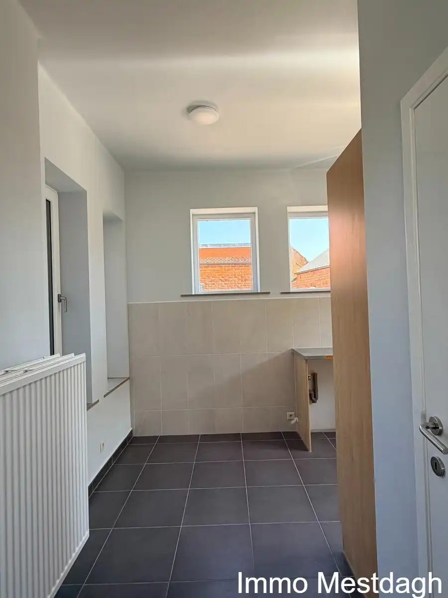 Prachtig gerenoveerd gelijkvloers appartement met terras en tuin in centrum Rummen foto 10