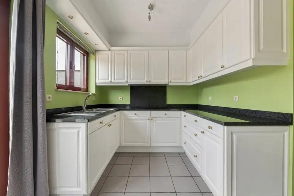 RUIM APPARTEMENT MET UITZONDERLIJK TERRAS VAN +50M² IN SINT-TRUIDEN foto 14