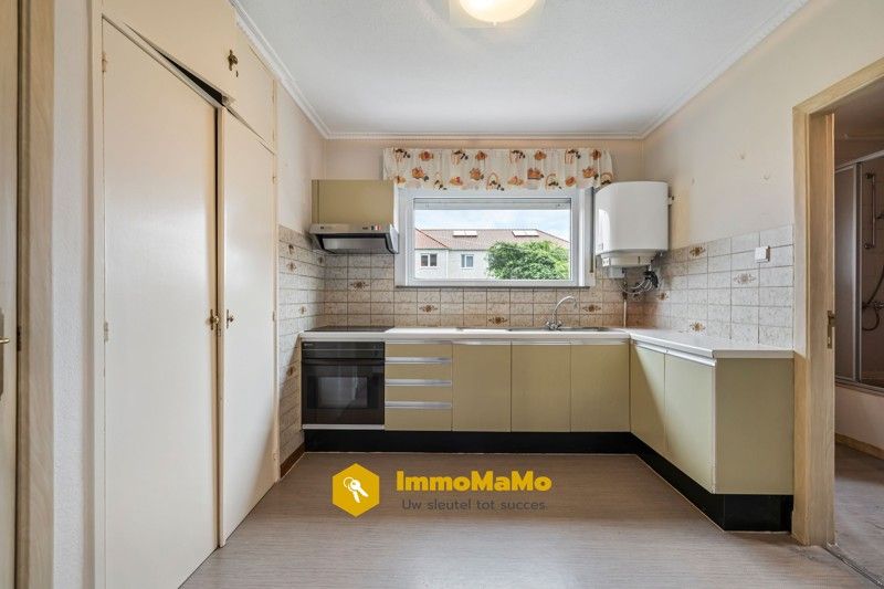 Te renoveren woonst in een rustige wijk te koop in Moerbeke foto 6