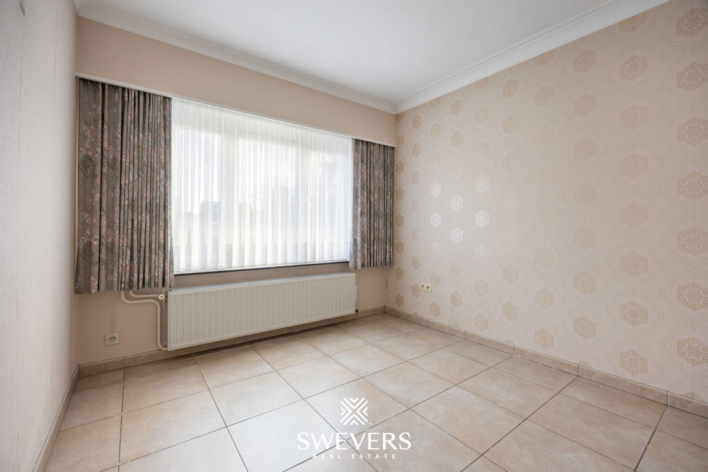 Te renoveren ruime gezinswoning met vijf slaapkamers en uitbreidingsmogelijkheden foto 14