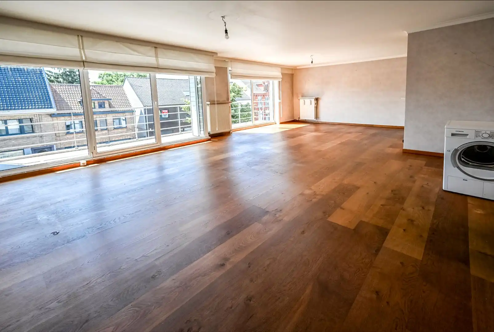 Ruim energiezuinig appartement met 3 slaapkamers te Waarschoot foto {{pictureIndex}}
