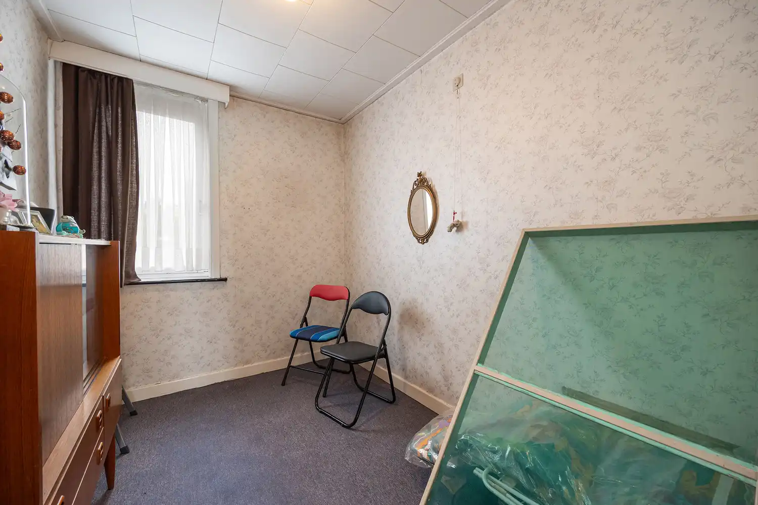 Halfopen woning op 575 m² met garage, carport en diepe tuin – te renoveren foto 24