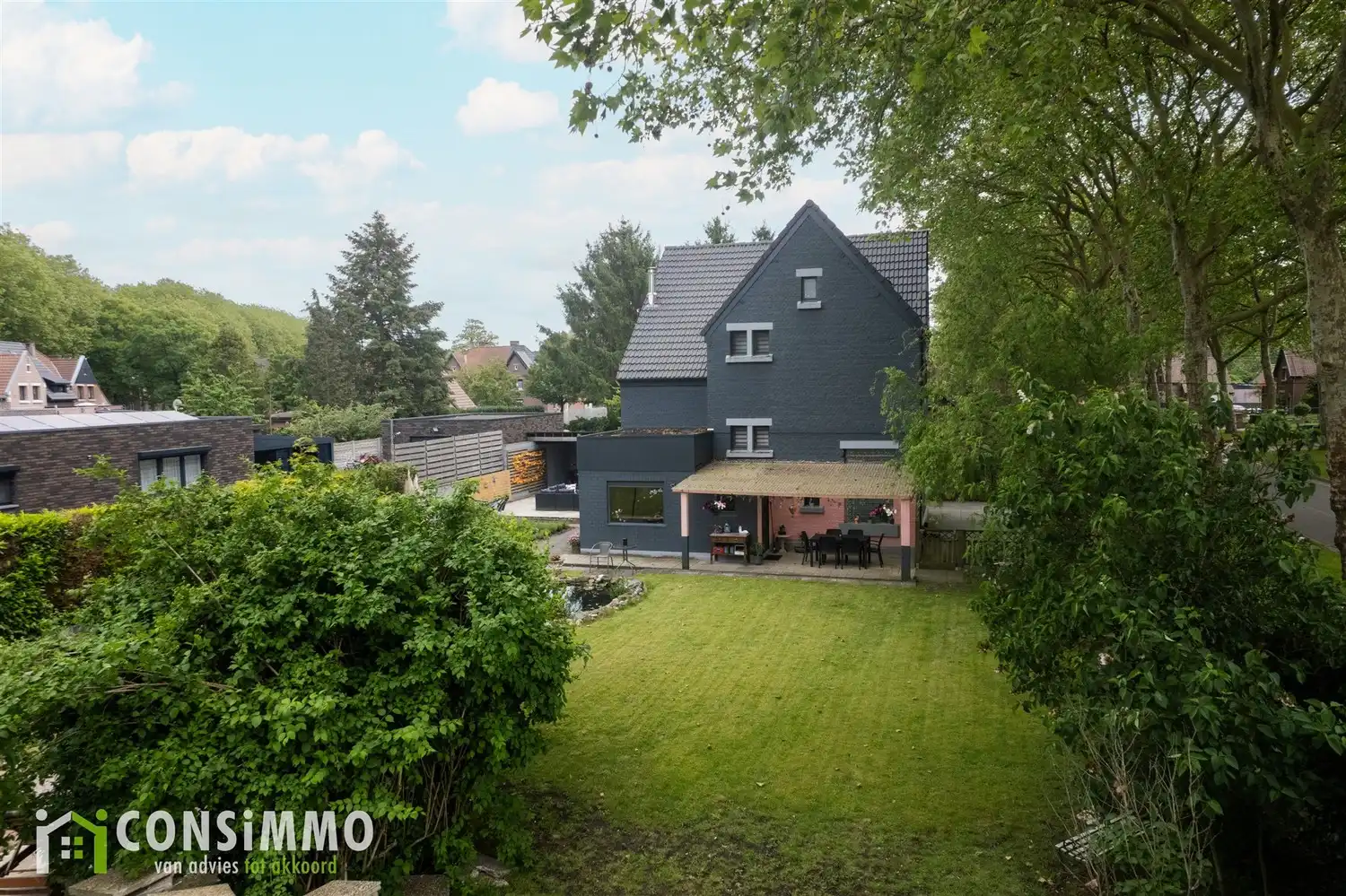 Vrijstaande karaktervolle mijnwoning in de tuinwijk van Waterschei foto 3