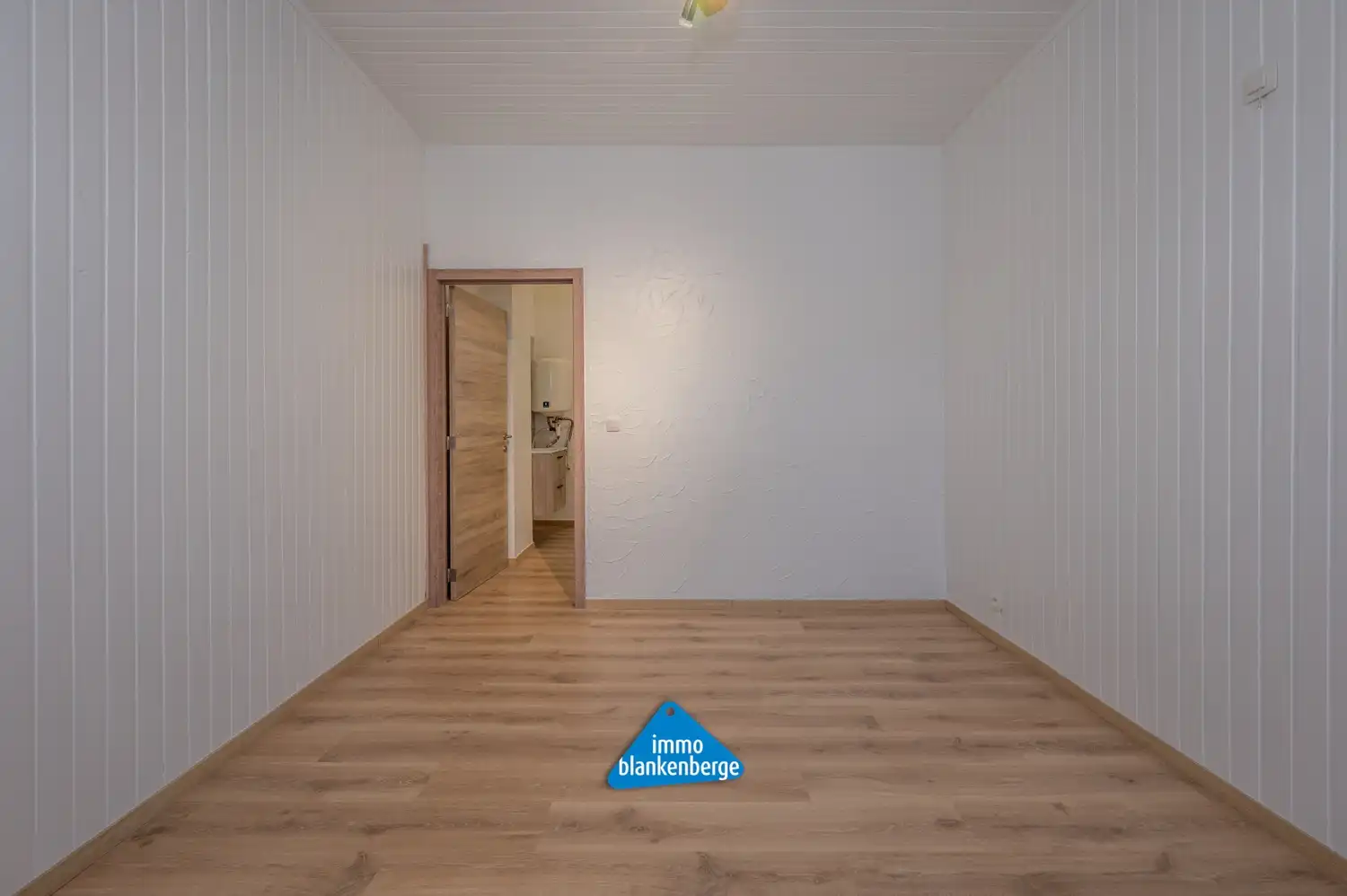 Volledig gerenoveerde rijwoning met één slaapkamer foto 7