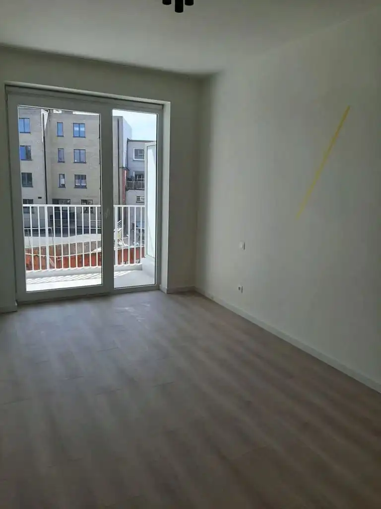 Tweekamerappartement met terras en twee binnenstaanplaatsen foto 5