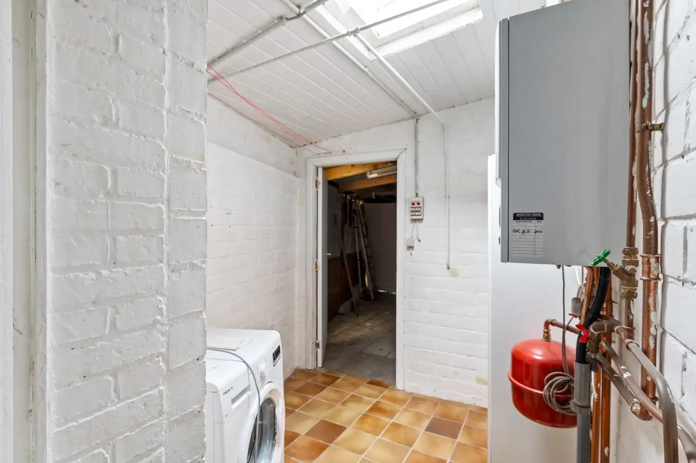 Leuke starterswoning met 2 slpk., garage en gezellig west-tuintje foto 13