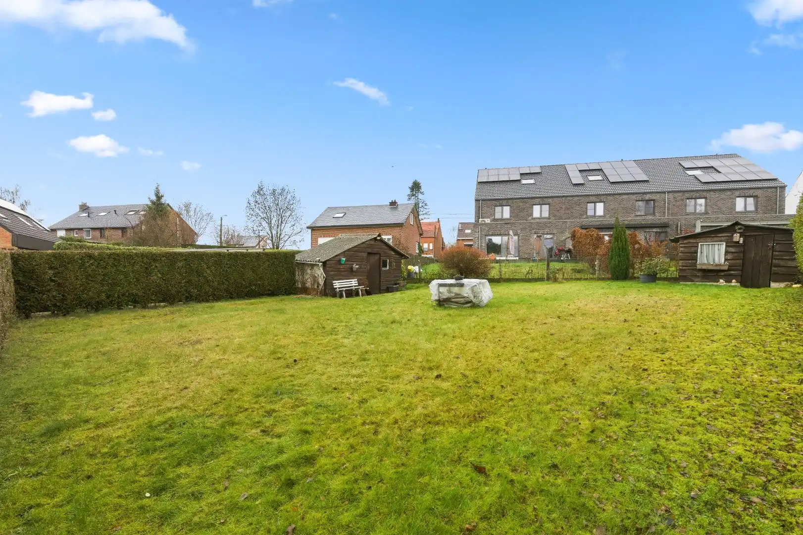 Zeer goed gelegen open bebouwing met 2 zeer ruime slaapkamers, garage en aangelegde tuin met terras foto 25