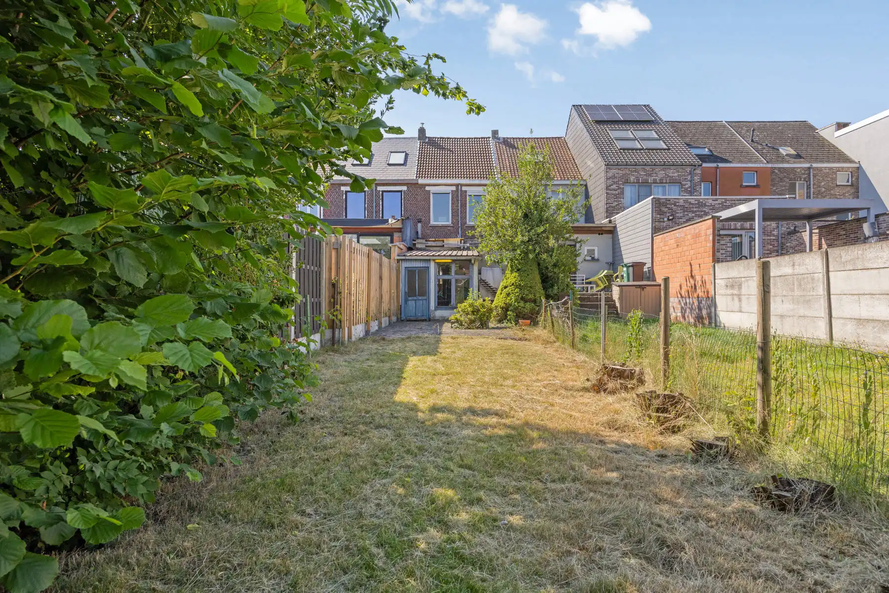 TE KOOP - gesloten bebouwing met 2 slaapkamers en tuin foto 16