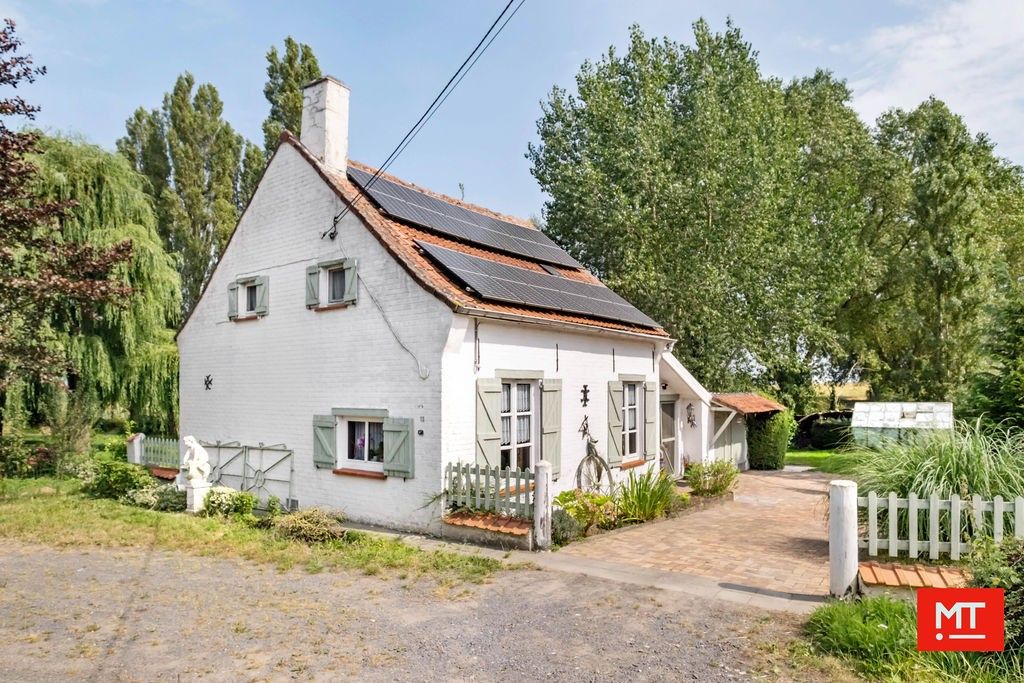 CHARMANTE WONING MET EEN PRACHTIGE TUIN OP EEN LANDELIJKE LOCATIE TE BESELARE foto 19