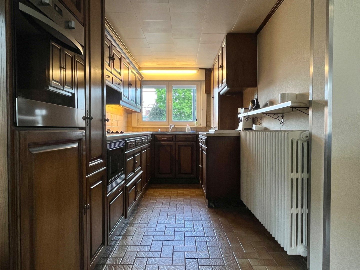 Alleenstaande woning te koop in Kuurne met ruime tuin, 3 slaapkamers en een topligging.  foto 8