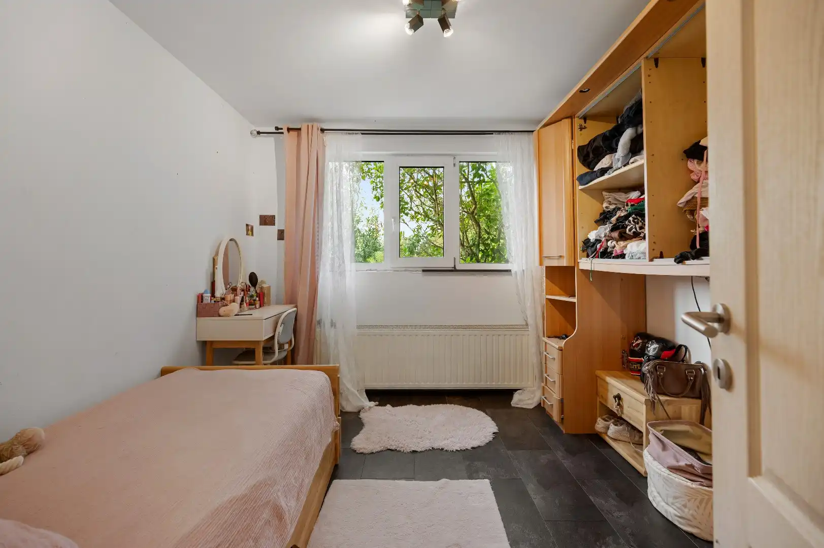 Instapklare gezinswoning met 4 slpks en ruime zuidwestgerichte tuin foto 15