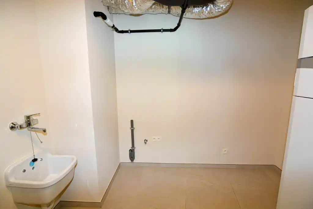 Gelijkvloers nieuwbouwappartement 124 m² met 2 slpk, tuintje en 2 autostandplaatsen. foto 19