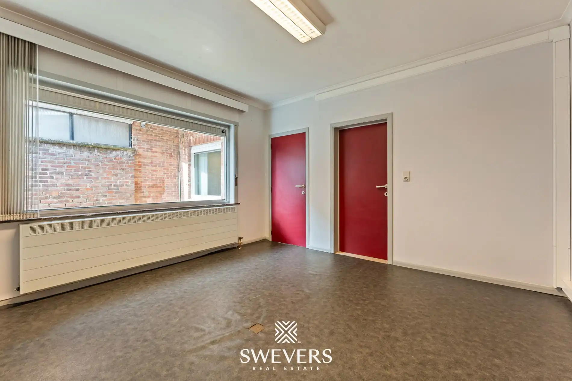 Authentiek pand (°1850) ruim duplex appartement met handelsruimte foto 7