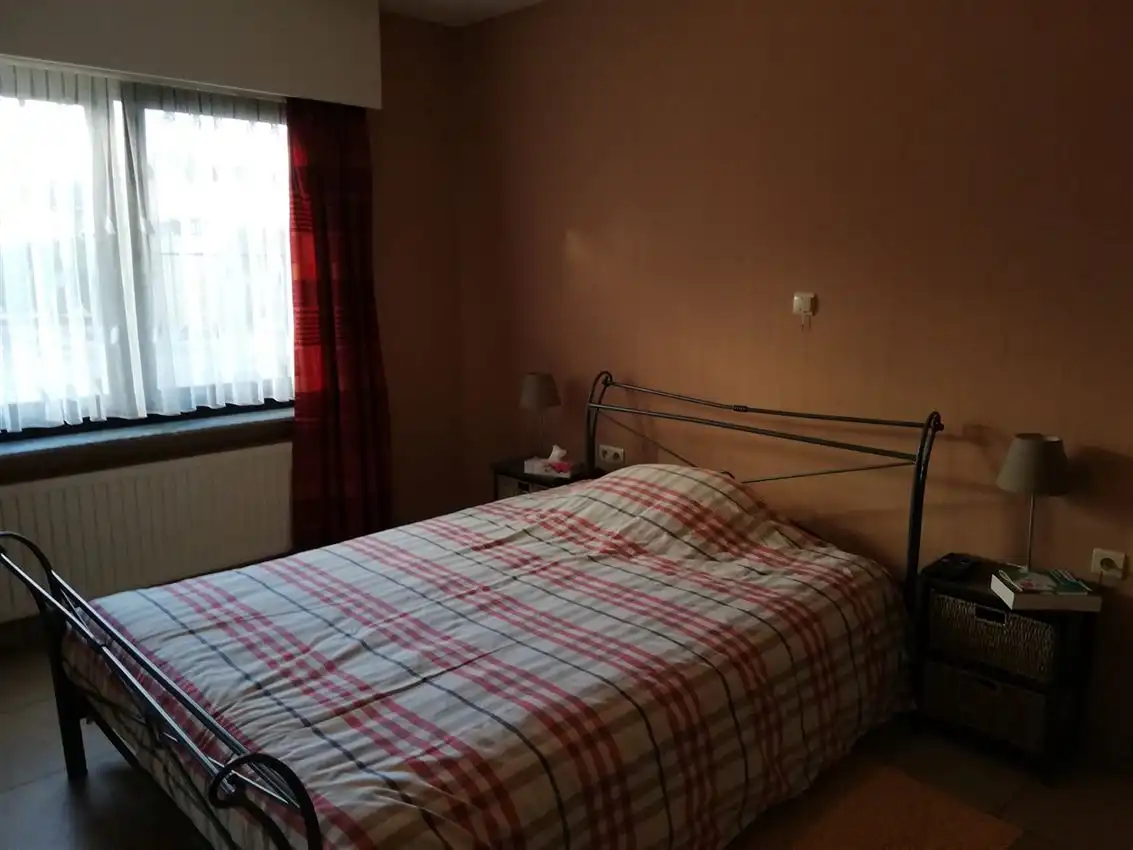 Verzorgd gelijkvloers app. met 2 slpk., terras en garage foto 15