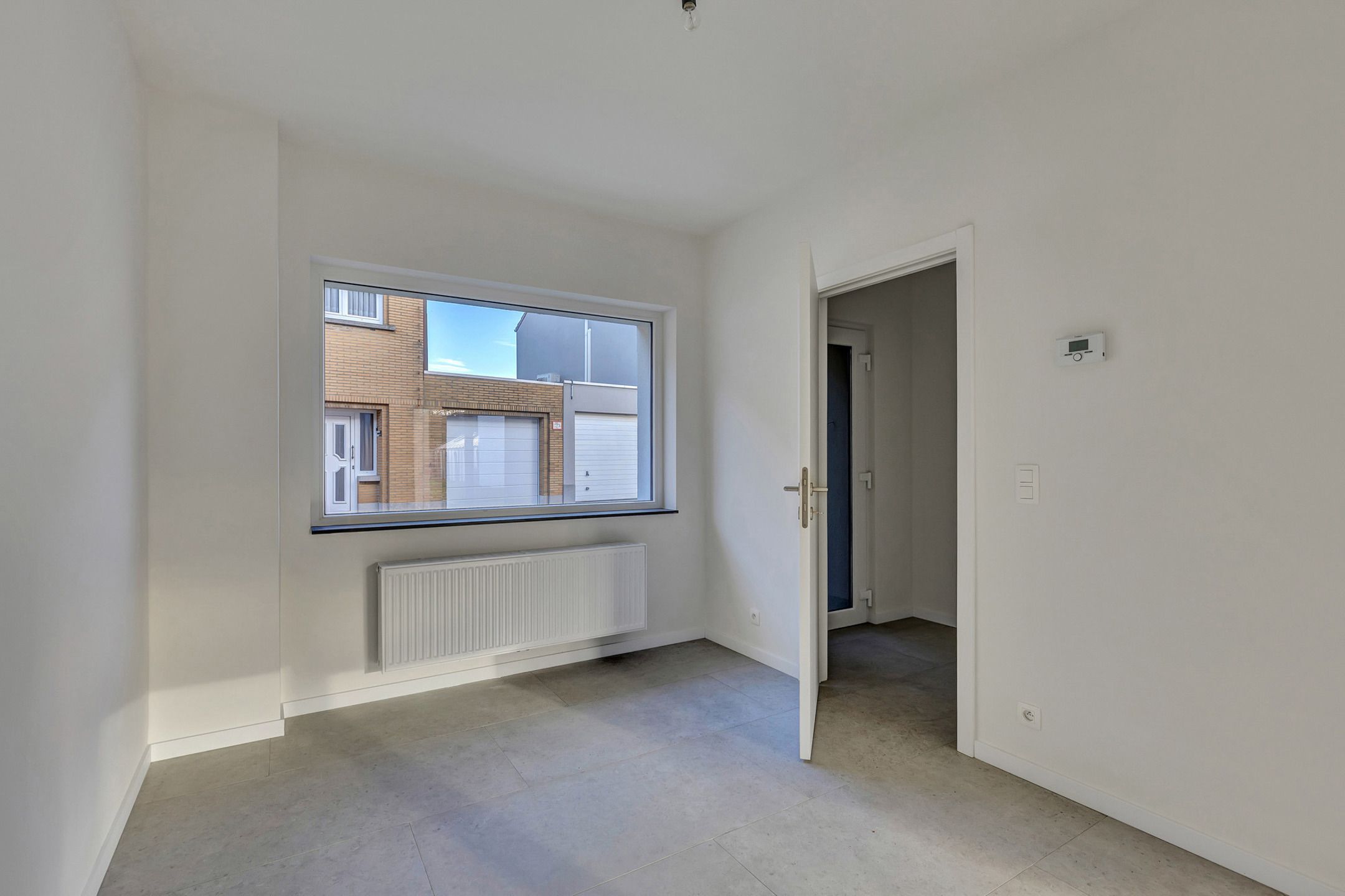 Volledig gerenoveerde woning met 4 slpks en tuin foto 3