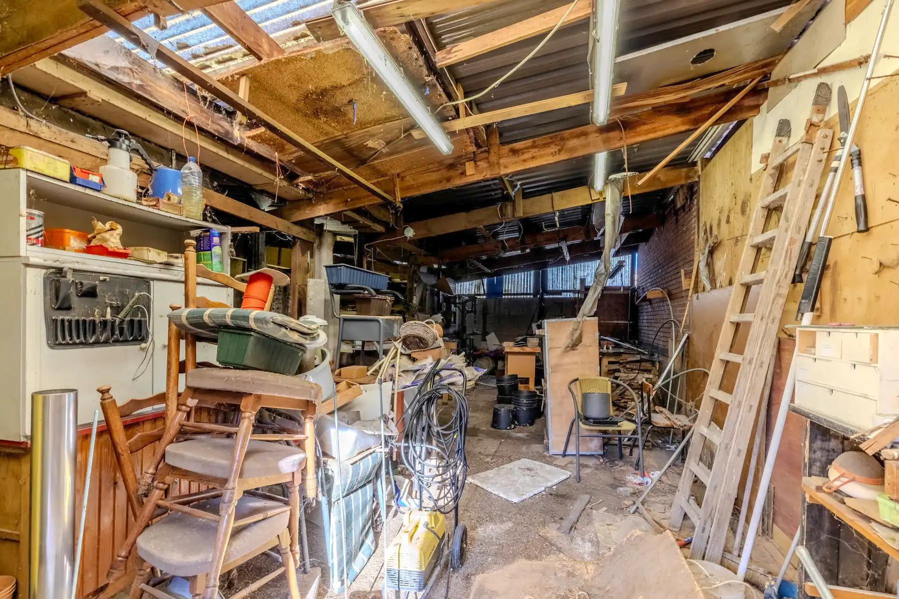 Te renoveren woning met 3 slpk, inpandige garage en tuin foto 25