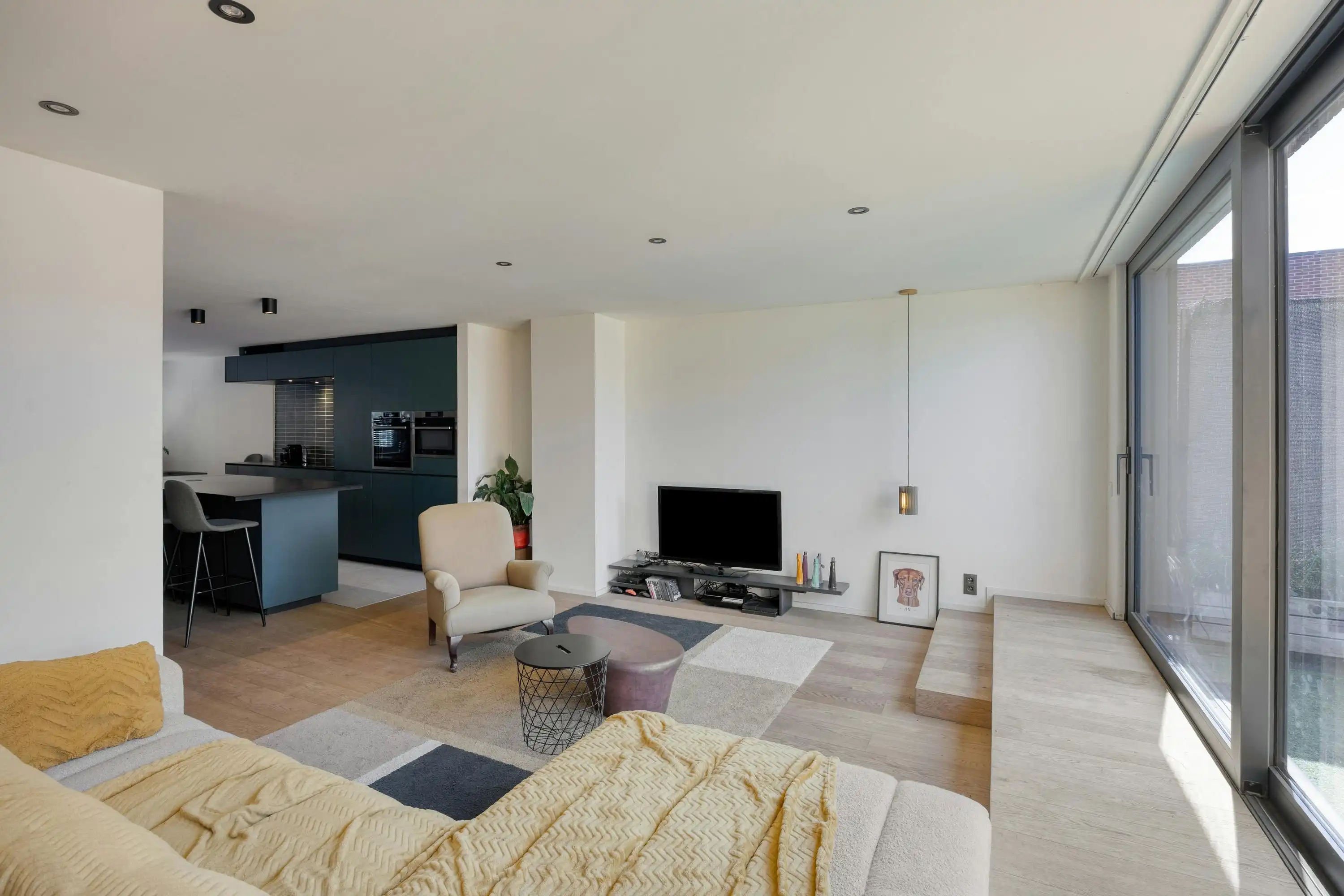 Unieke stadswoning met terras, atelier en garage te koop foto 3