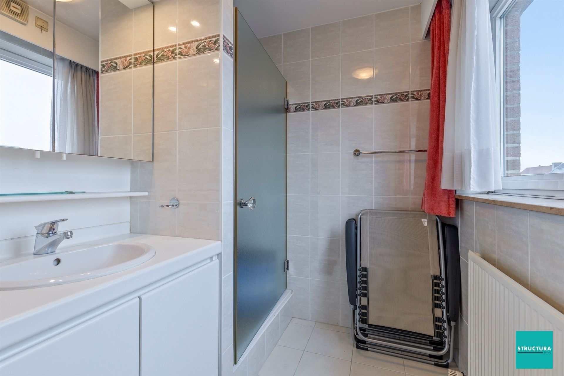 Ruim penthouse met drie slaapkamers, kelderberging en garage op toplocatie. foto 14