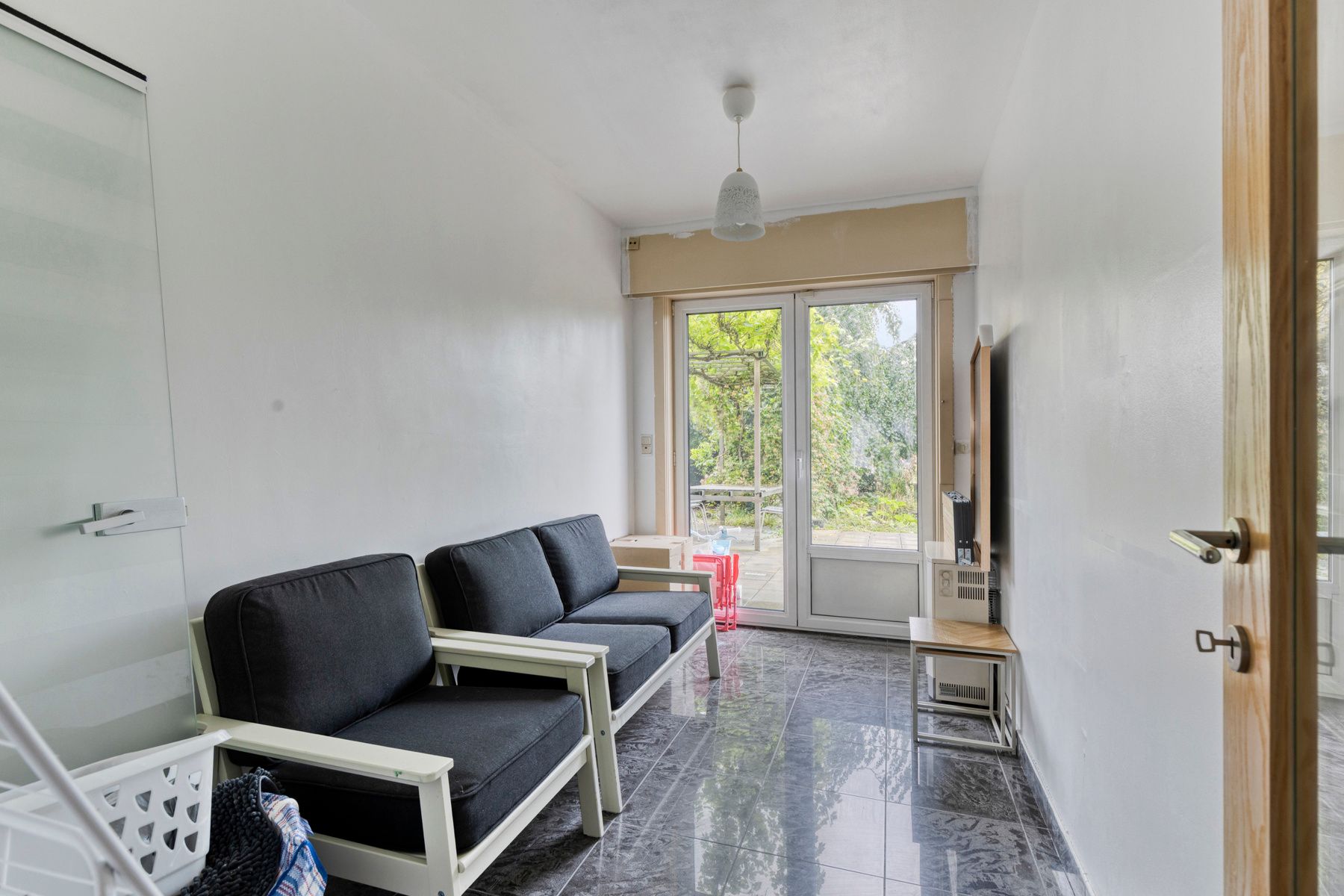 Licht en ruimte in dit appartement met tuin, inpandige garage en lift foto 8