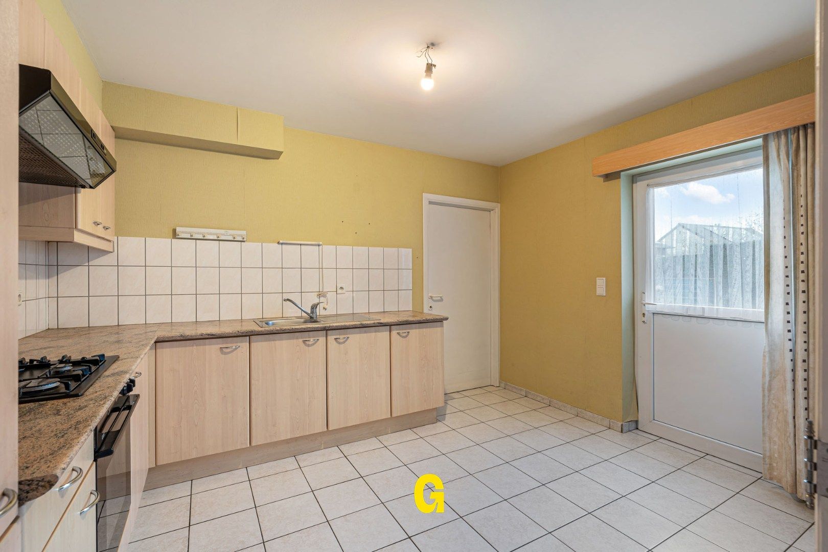 Degelijk (rolstoelvriendelijk) gelijkvoersappartement met terras uitgevend op de tuin, afsluitbare garage en berging foto 14