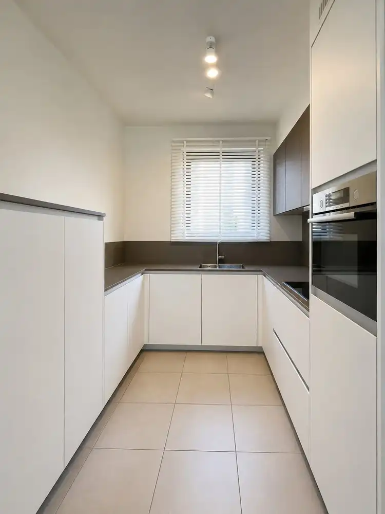 Moderne gezinswoning met 3 slaapkamers, tuin en garage in het hart van Zutendaal foto 3