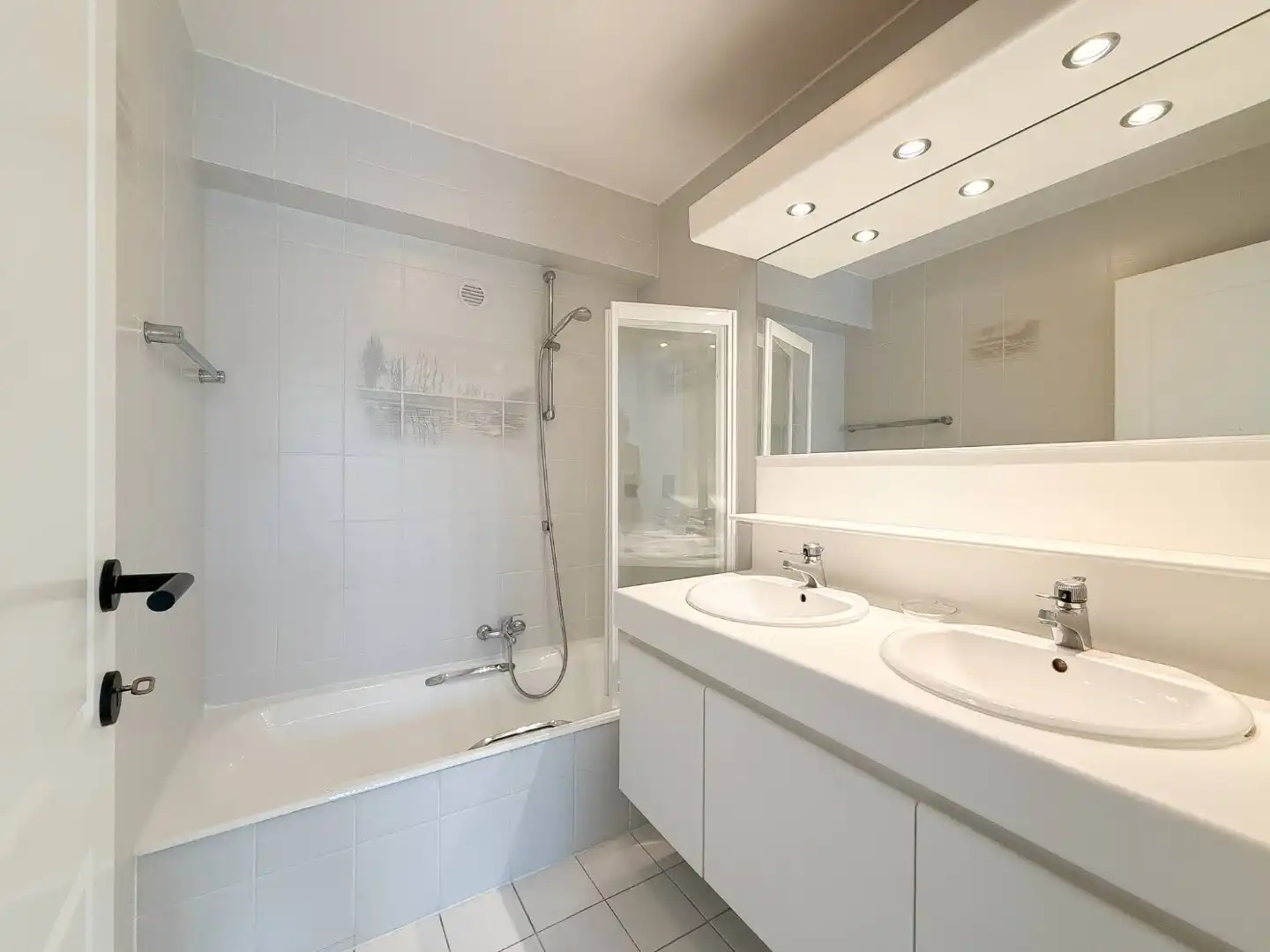 Ongemeubeld hoekappartement in hartje Zoute nabij het Albertplein foto 10