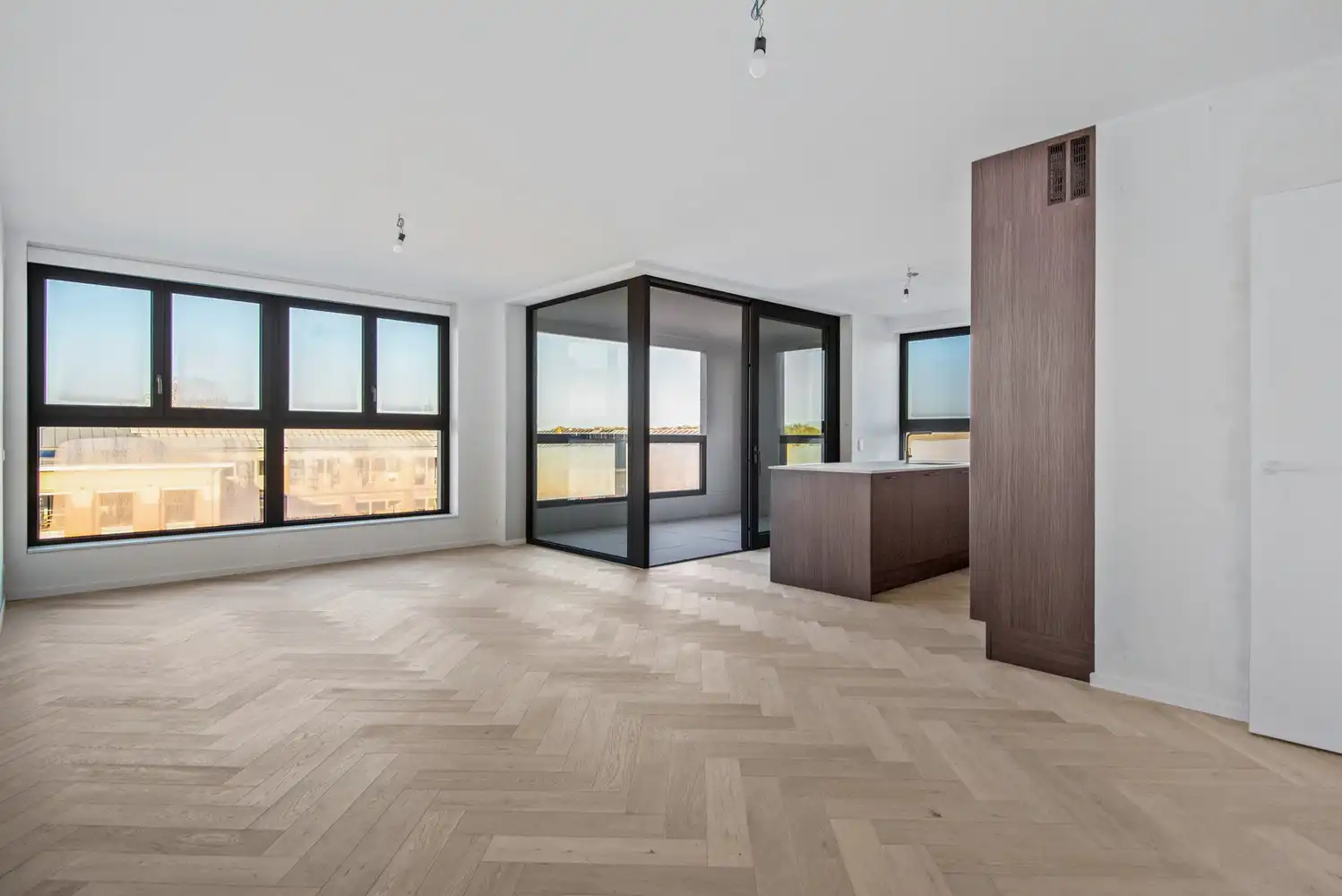 Exclusief 3-slaapkamerappartement met wintertuin op de bovenste verdieping – De Lesselier foto {{pictureIndex}}