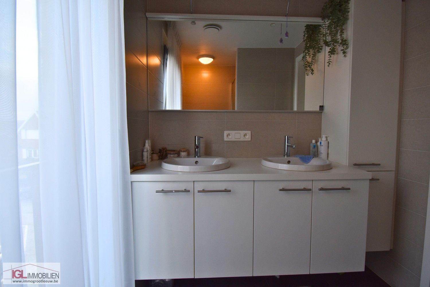 Triplex nieuwbouwappartement met 4 slaapkamers en garage foto 12