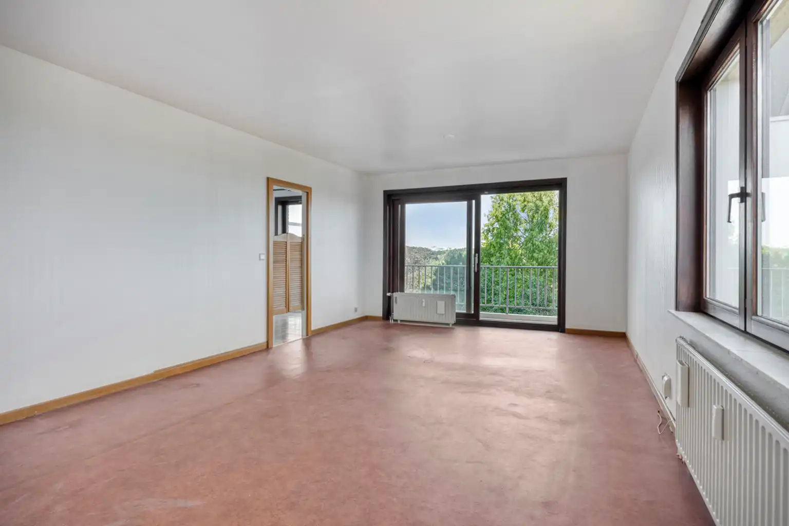 Ruim 3-slaapkamerappartement met garage op toplocatie foto 6