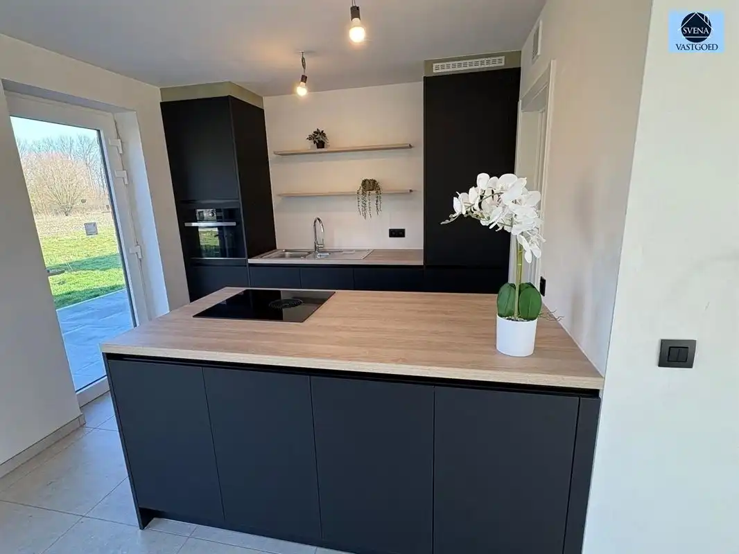  HALFOPEN NIEUWBOUWWONING MET 3 SLAAPKAMERS EN TUIN foto 7