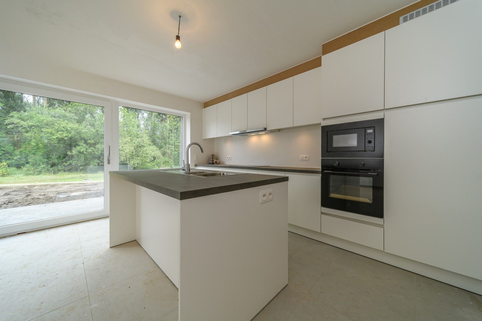 Gesloten bebouwing met tuin te Haaltert foto 6