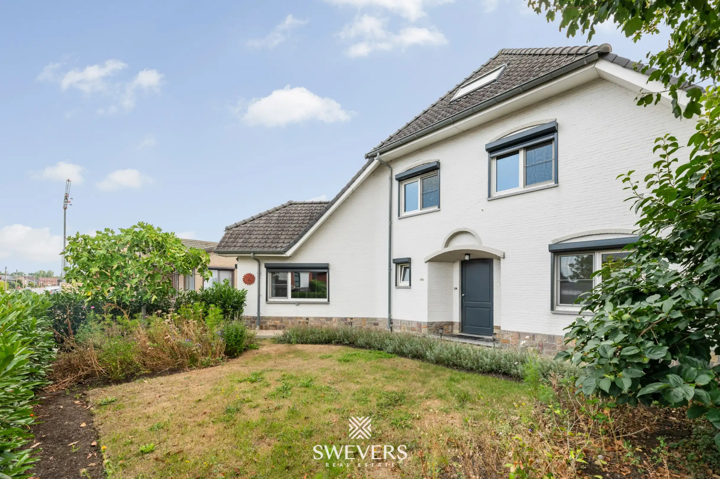 Hoofdfoto van de publicatie: Open bebouwing met 3 slaapkamers, zuidgerichte tuin, garage en carport in Koersel