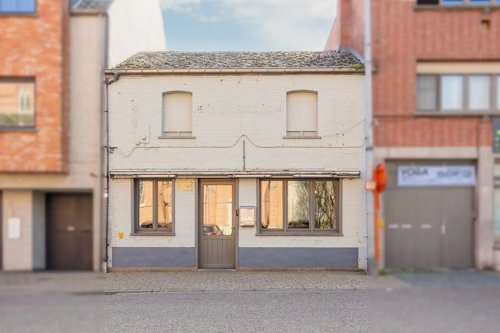 Handelszaak met mogelijkheid tot eengezinswoning foto {{pictureIndex}}