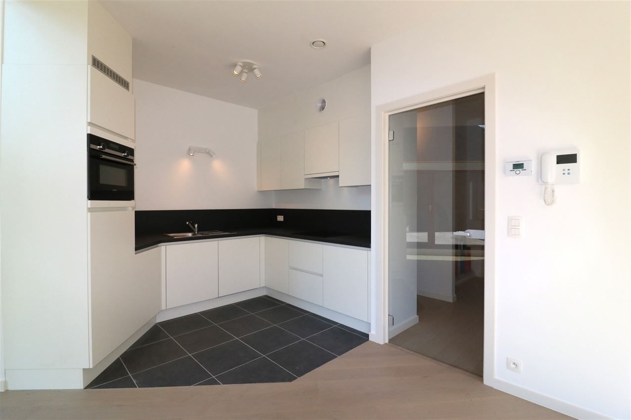 Bijzonder opgevat penthouse, 2 slpk., garage, groot terras foto 12